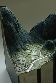 Carved Book Landscapes by Guy Laramee | Colossal #sculpture
