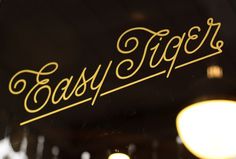 "Easy Tiger" store front typography #tiger #script #easy #typography