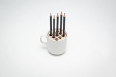 The Adapter | Colossal #office #mug #pen #tea #coffee #pencils