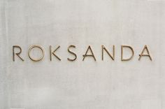 Roksanda Gold Signage on Concrete #logo #lettering #gold
