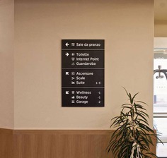 Discover stunning hotel wayfinding signage designs, perfect for navigating complex spaces, with inspiration from this beautiful example.