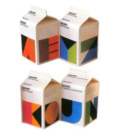 A retro milk carton design from the 1980s featuring Ducats, showcasing bold typography, bright colors, and nostalgic packaging.