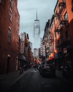 Cinematic street photography in New York City by Ray H. Mercado, capturing urban life, architecture, and people in motion.