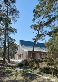 This Scandinavian Wooden House Has a Tent-Like Roof Over a Generous Interior Space 2