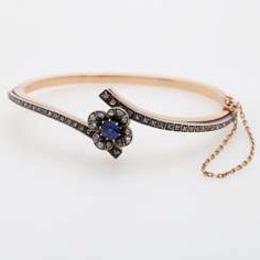 Gold bangle with sapphire and diamonds,