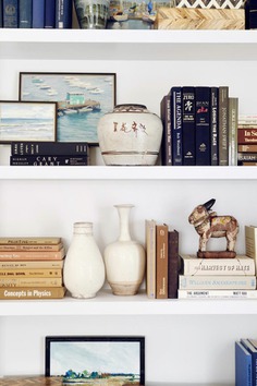 inspiring shelf styling from betsy burnham design. #shelfie #shelfstyling #interiordecorating #ceramics #vintagedecor #vintage #decor #shelving #bookshelves #bookcase #betsyburnham #styling