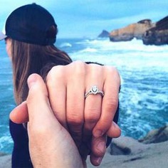 Showing off that stunning engagement ring and their love