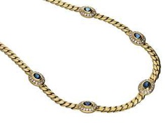 Chain: the massive, and formerly very expensive sapphire/diamond gold necklace