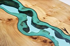 Table Topography: Wood Furniture Embedded with Glass Rivers and Lakes by Greg Klassen wood table rivers lakes furniture #design #table #embedded #glass #product #wood #topography #river