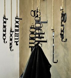 Artistic design of clothes hangers #artistic #pizzeria #decor #restaurant #art #pizza #decoration