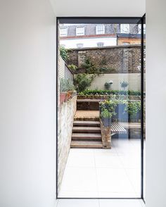 Grade II listed Chelsea town house extension by Moxon Architects