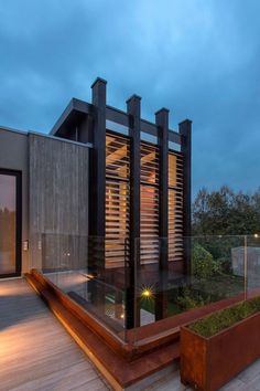 Modern Concrete Block House with Wooden Patio Attached