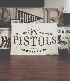 Typeverything.com — Hand painted sign by @neuarmy for @rivalbroscoffee.Clint Eastwood quote, black and gold 1shot on reclaimed wood. #pistols