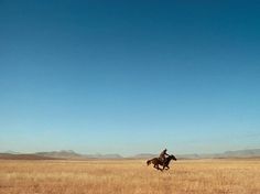 West Texas Cowboy Photo, Landscape Wallpaper – National Geographic Photo of the Day #horse #west #grass #sky #yellow #plains #texas #blue #cowboy