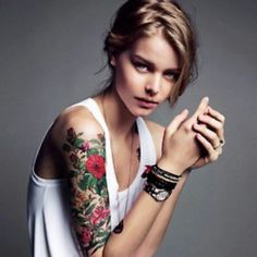 http://media cache ec4.pinimg.com/originals/3d/a9/13/3da91321da6fe719c4ef51ac60316e99.jpg #tattoo #arm #flowers
