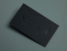 Logo and business card with black deboss foil detail created by Graphical House for interior design consultancy Noam #interior #house #business #created #card #design #black #deboss #noam #logo #consultancy #graphical #detail #foil