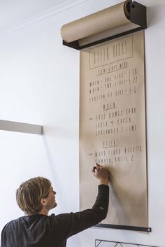 Wall mounted kraft paper roll display Studio Roller by George and Willy - www.homeworlddesign. com (1) #kraft #paper #dispenser