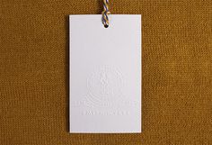 Smith Wykes designed by Studio Small #emboss #label #tag #identity #logo #paper