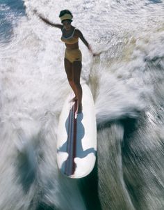 A Brief History of Surfing · Stampsy #surfer #woman #surfing #motion #board #long