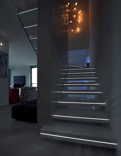 Corian® hanging stairs LUXO SURFACES by OFFICINE SANDRINI