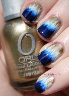 Blue, white and silver colored Ombre nail art. Give your Ombre nails a twist by adding glitter polish to make them stand out more.