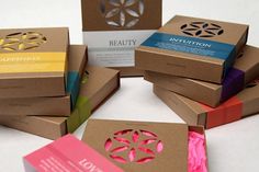 EightÂ Energy - TheDieline.com - Package Design Blog #die #cut #cardboard #color #simple #identity #spectrum #logo #band