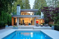 James K.M. Cheng Architects have designed this house in Vancouver, Canada, that is positioned on a lot 350 feet in length and is surrounded