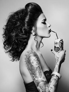 Explore stunning black-and-white photography featuring tattooed women, showcasing unique designs, styles, and inspirations.
