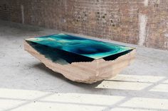 duffy london layers the abyss table to look like ocean depths #glass #furniture #table