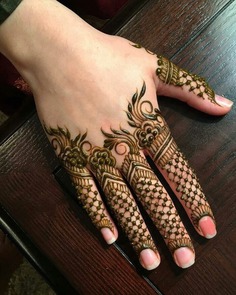 Discover stunning criss cross jaali prints finger mehndi designs perfect for brides, ideal for wedding ceremonies, with intricate patterns and beautiful artwork.