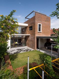 Impressive Brick Home with Open and Glazed Living Spaces