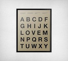 An alphabet poster designed by Victor Eide, featuring colorful letters on a white background, perfect for print design inspiration.