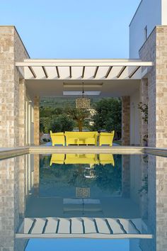 Kalamaki Villa on the Coast of Greece / MGXM Architects