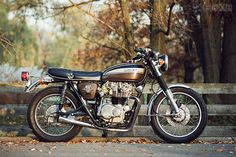 A stunning custom Honda CB450 motorcycle with vintage flair, showcasing its sleek design, chrome accents, and nostalgic charm.