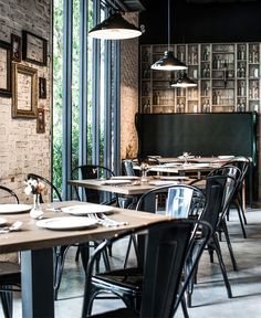 Space with Attractive Exposed Brick Walls - InteriorZine #restaurant #decor #interior