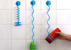 This fun and simple shower organizer will cut down on the clutter and keep bottles close at hand. Hang your shampoo upside down to get every #product #lifestyle #design #modern