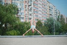 Levitation Photography: Little Ballerina On The Streets Of Bucharest by Andrei Mihai