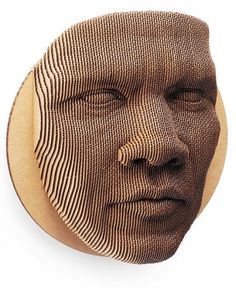 An 87-piece topographical cardboard face mask | Colossal #mask #sculpture #paper #cardboard