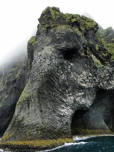 An Elephant Appears to emerge from a cliff