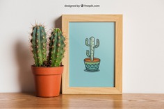 Frame mockup with cactus Free Psd. See more inspiration related to Flower, Frame, Mockup, Floral, Wood, Template, Table, Floral frame, Mock up, Plant, Decoration, Creative, Flower frame, Interior, Cactus, Plants, Decorative, Wooden, Creativity, Pot, Up, Decor, Wood frame, Wooden table, Flower pot and Mock on Freepik.