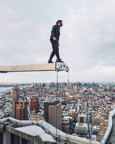 Daredevil Photographer Denis Krasnov Climbes Huge Skyscrapers To Take Stunning Photos