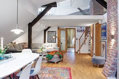 Joyful Attic Apartment Overlooking Colorful Roofs in Gothemburg, Sweden #apartment #architecture #home #modern
