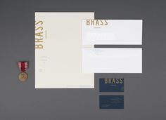 Stationery with blind emboss and bronze metallic ink detail for Somerville pub and cocktail bar Brass Union designed by Oat #letterhead #identity