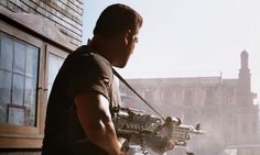 Get high-quality wallpaper featuring Bollywood superstar Salman Khan in Machine Gun Tiger Zinda Hai movie scene, perfect for desktop or mobile backgrounds.