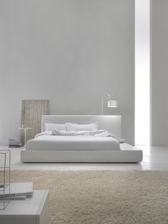 Contemporary minimalist interior white bedroom