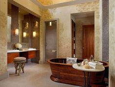 Luxury bathroom with brown bathtub #interior #house #artistic #decor #art #paintings #residence