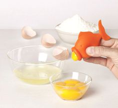 This cute kitchen utensil will help you separate your eggs in one easy step. Just squeeze the head of this rubber fish egg yolk separator an #lifestyle #design #home #product #kitchen #industrial