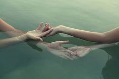 Follow me on Instagram ☯ #submerged #water #touch #fingers #intertwined #intimacy #photography #hands #underwater