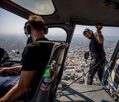 Daredevil Photographer Jin-Woo Prensena Hangs Out of Helicopters to Take Spectacular Aerial Photos