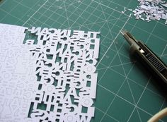 Typo Lamp on the Behance Network #letters #blade #exacto #cutting #paper #typography
